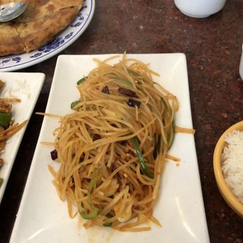 Old Mandarin Islamic Restaurant signature dishes Beijing Style Hot Pot, Lamb with Explosive Chili Pepper, Cumin Lamb, Hand-Pulled Noodles